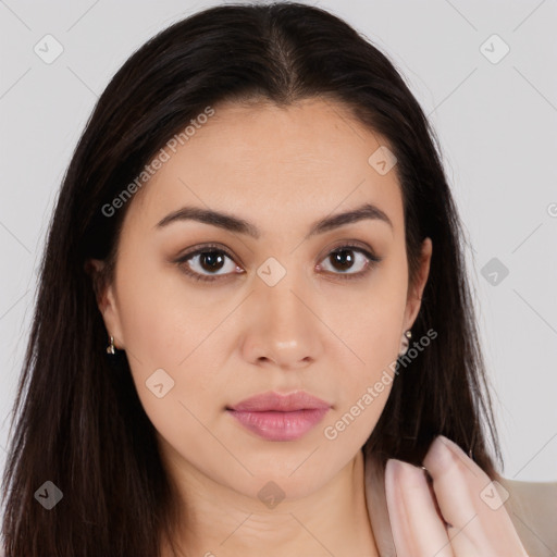 Neutral white young-adult female with long  brown hair and brown eyes