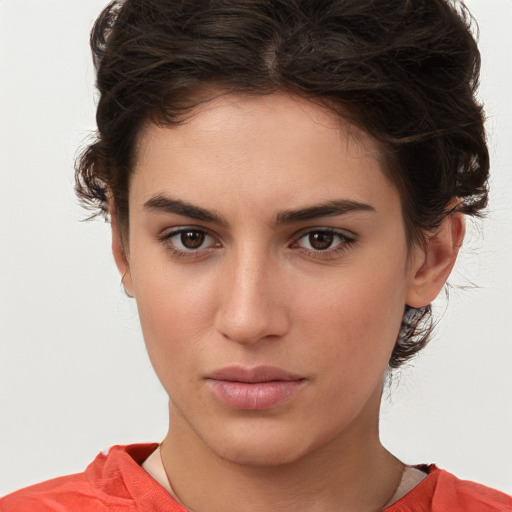 Neutral white young-adult female with short  brown hair and brown eyes