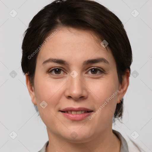 Joyful white young-adult female with short  brown hair and brown eyes