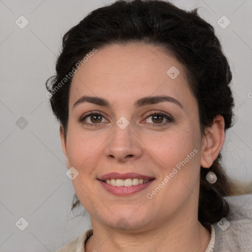 Joyful white adult female with short  brown hair and brown eyes