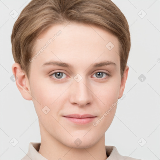 Joyful white young-adult female with short  brown hair and grey eyes