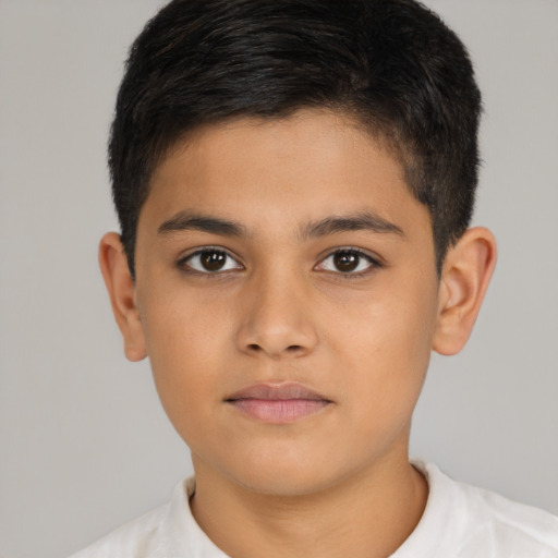 Neutral latino child male with short  brown hair and brown eyes