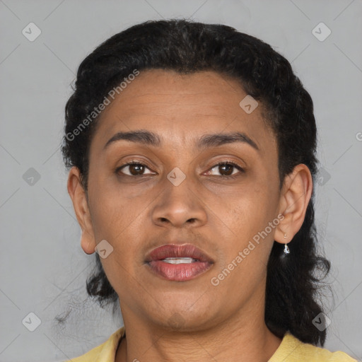 Joyful latino young-adult female with short  brown hair and brown eyes