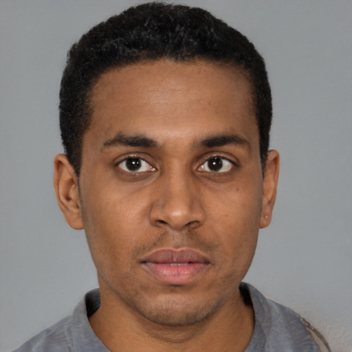 Neutral latino young-adult male with short  brown hair and brown eyes