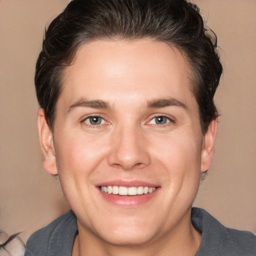 Joyful white young-adult male with medium  brown hair and brown eyes