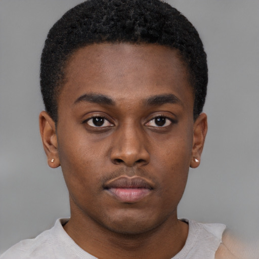 Neutral black young-adult male with short  brown hair and brown eyes