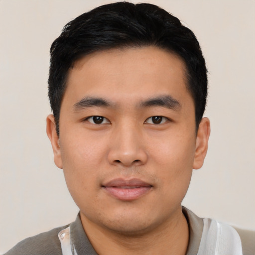 Neutral asian young-adult male with short  black hair and brown eyes