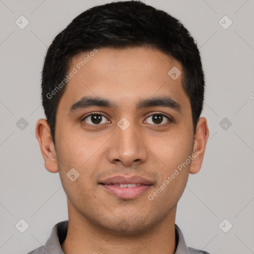 Joyful latino young-adult male with short  black hair and brown eyes