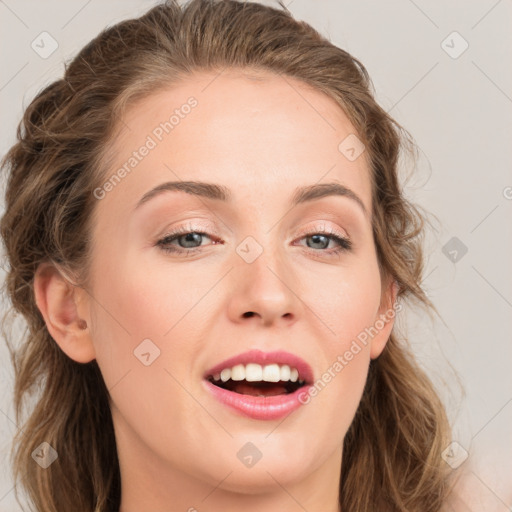 Joyful white young-adult female with long  brown hair and blue eyes