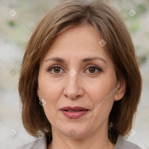 Joyful white adult female with medium  brown hair and brown eyes