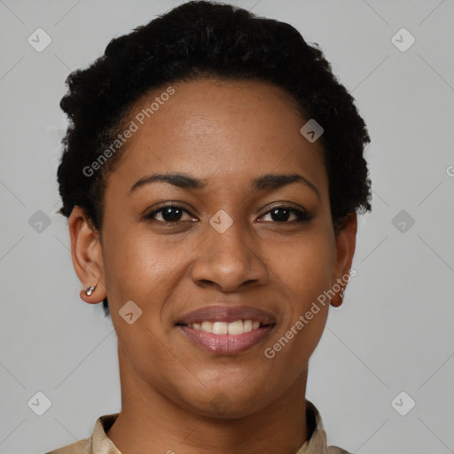 Joyful black young-adult female with short  black hair and brown eyes