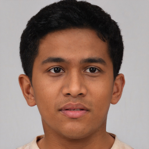Neutral latino young-adult male with short  brown hair and brown eyes