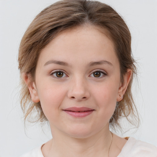 Joyful white child female with medium  brown hair and brown eyes