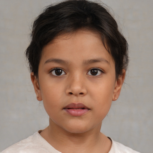 Neutral white child female with short  brown hair and brown eyes