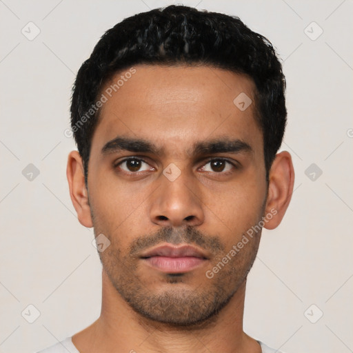 Neutral latino young-adult male with short  black hair and brown eyes