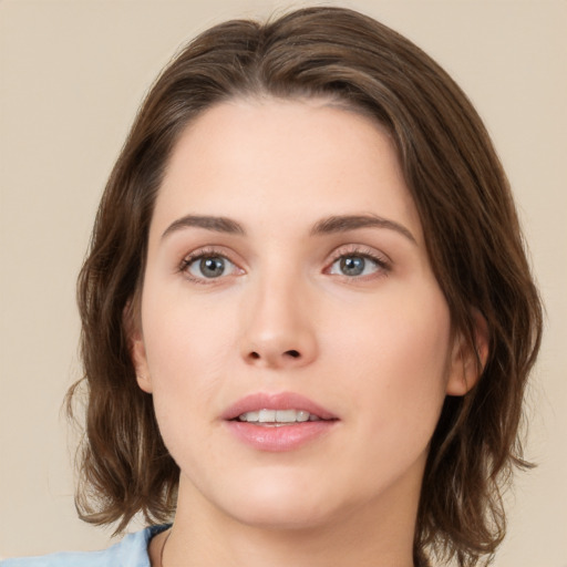 Neutral white young-adult female with medium  brown hair and brown eyes