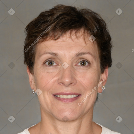 Joyful white adult female with short  brown hair and brown eyes