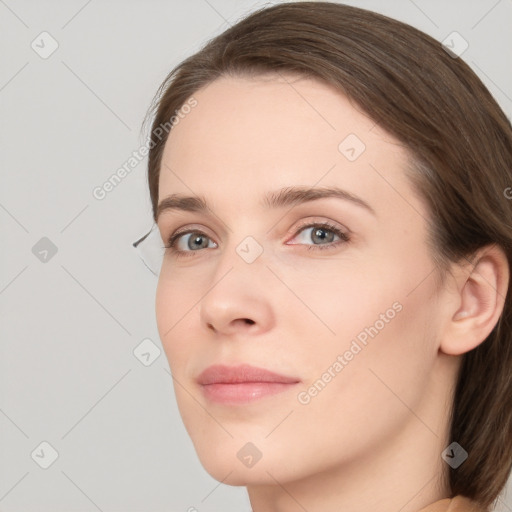 Neutral white young-adult female with long  brown hair and grey eyes