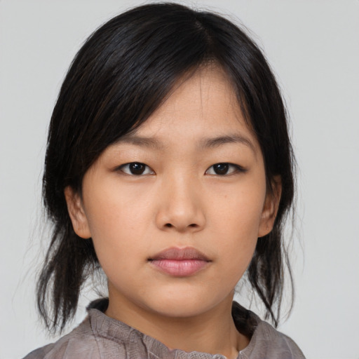 Neutral asian young-adult female with medium  black hair and brown eyes