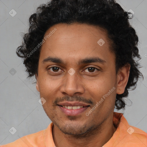 Joyful latino young-adult male with short  brown hair and brown eyes