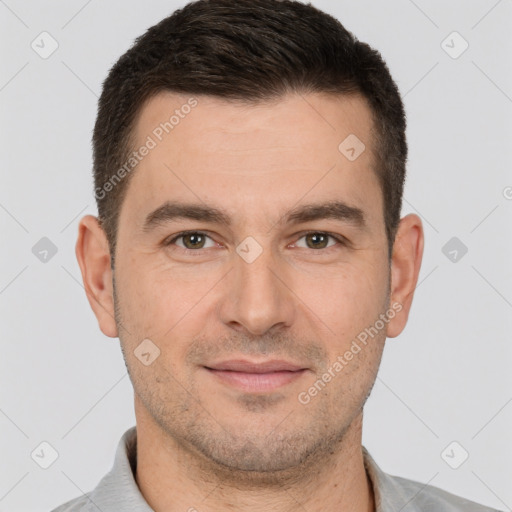 Joyful white young-adult male with short  brown hair and brown eyes