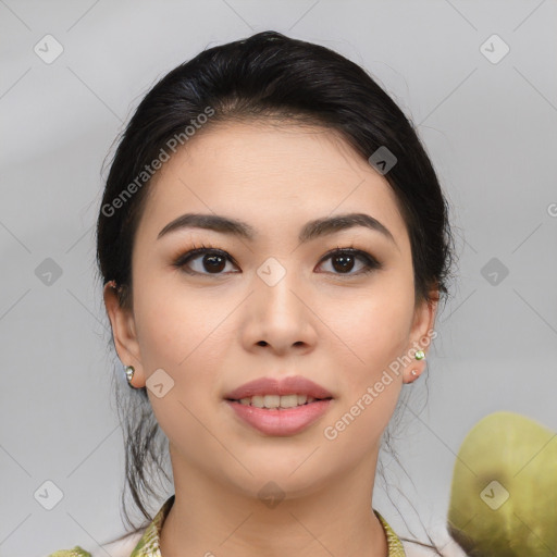 Joyful asian young-adult female with medium  brown hair and brown eyes