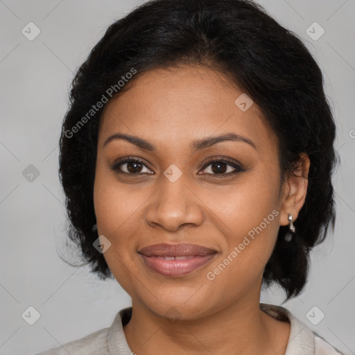 Joyful black young-adult female with medium  brown hair and brown eyes