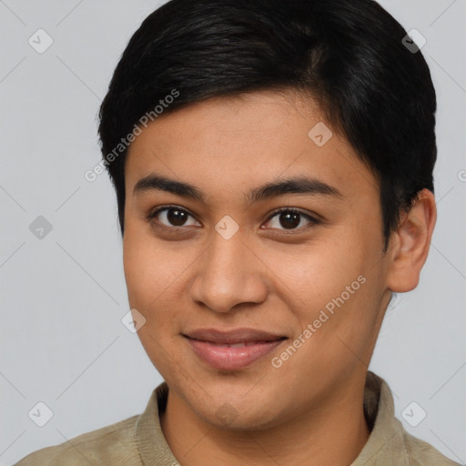 Joyful asian young-adult male with short  brown hair and brown eyes