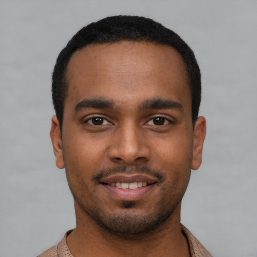 Neutral black young-adult male with short  black hair and brown eyes