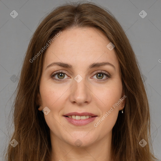 Joyful white young-adult female with long  brown hair and green eyes