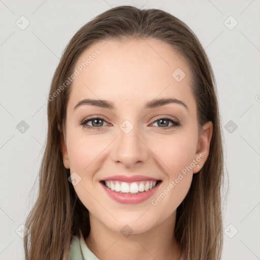 Joyful white young-adult female with long  brown hair and grey eyes