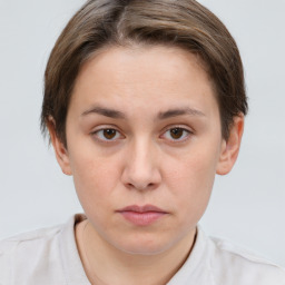 Neutral white young-adult female with short  brown hair and brown eyes