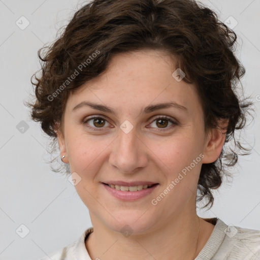 Joyful white young-adult female with medium  brown hair and green eyes