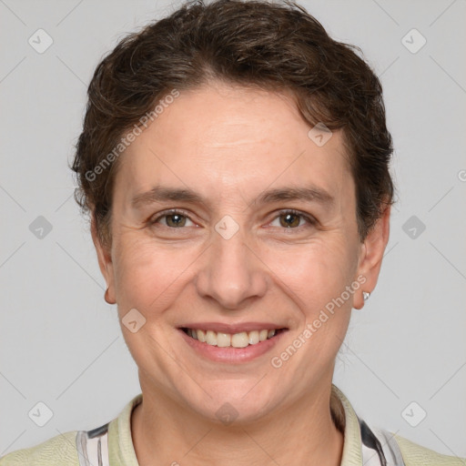 Joyful white adult female with short  brown hair and brown eyes