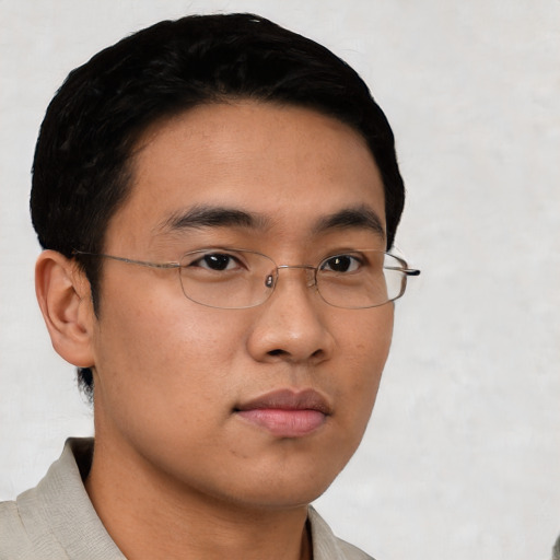 Neutral asian young-adult male with short  black hair and brown eyes