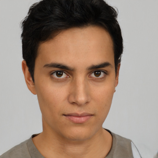 Neutral asian young-adult male with short  brown hair and brown eyes