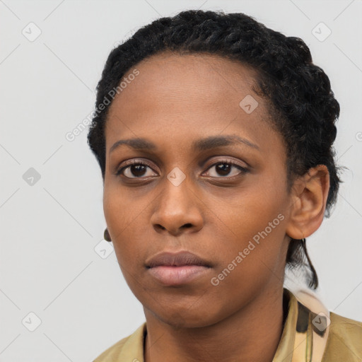 Neutral black young-adult female with short  black hair and brown eyes