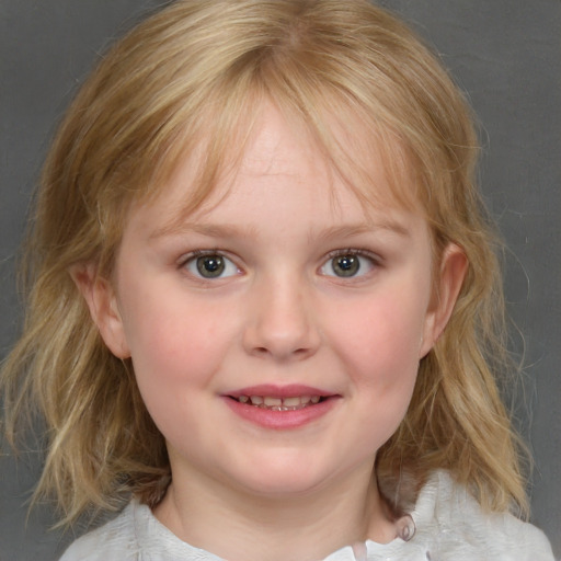 Joyful white child female with medium  brown hair and blue eyes