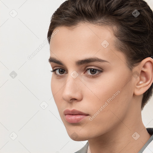 Neutral white young-adult female with short  brown hair and brown eyes