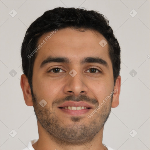 Joyful latino young-adult male with short  brown hair and brown eyes