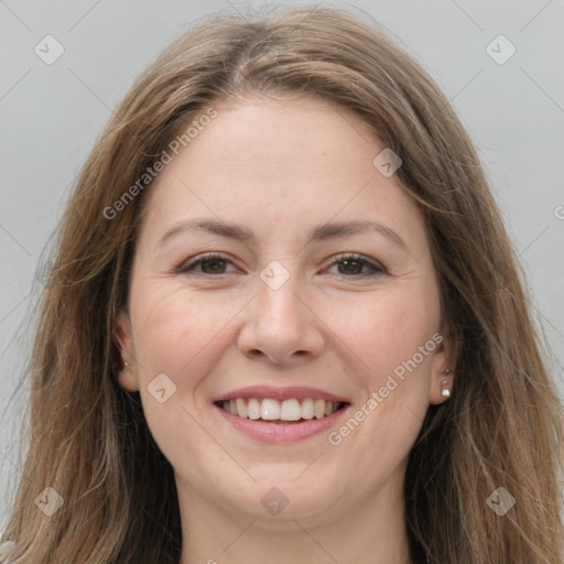 Joyful white young-adult female with long  brown hair and grey eyes