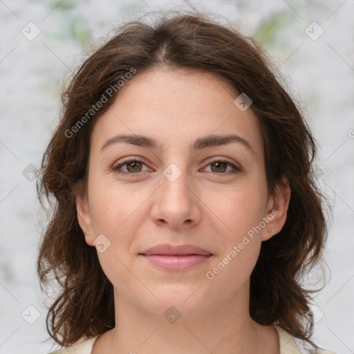 Joyful white young-adult female with medium  brown hair and green eyes