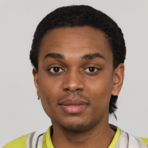 Neutral black young-adult male with short  black hair and brown eyes