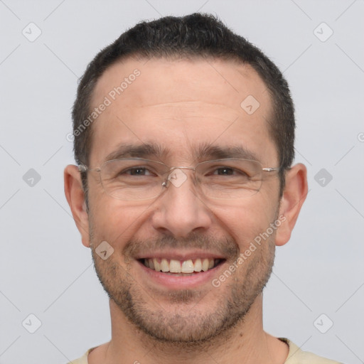 Joyful white adult male with short  brown hair and brown eyes