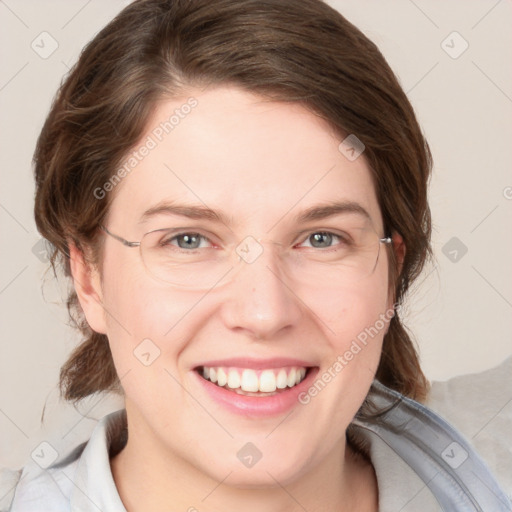 Joyful white young-adult female with medium  brown hair and blue eyes