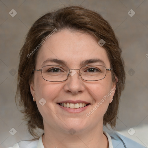 Joyful white adult female with medium  brown hair and green eyes