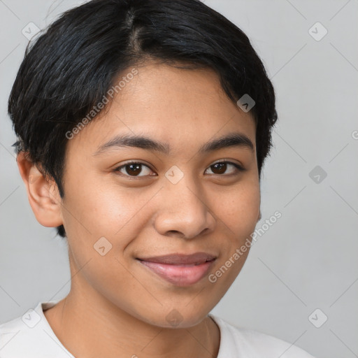 Joyful latino young-adult female with short  brown hair and brown eyes
