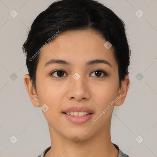 Joyful asian young-adult female with short  black hair and brown eyes