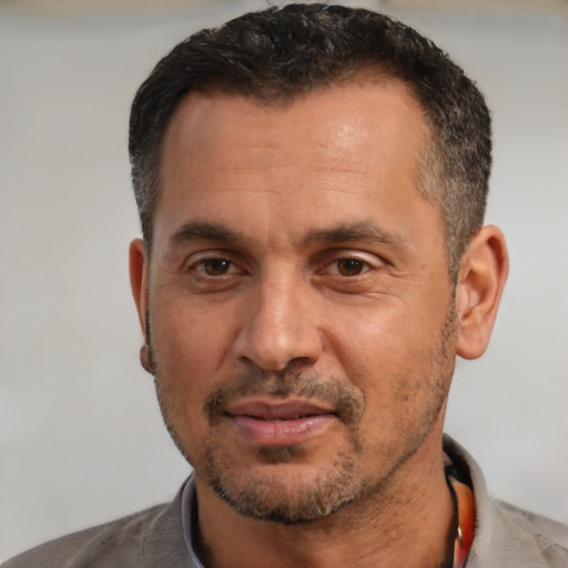 Neutral white adult male with short  black hair and brown eyes