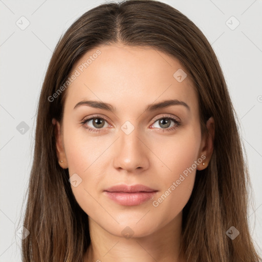 Neutral white young-adult female with long  brown hair and brown eyes